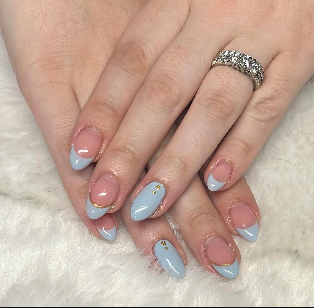 Light blue and gold manicure by Alia